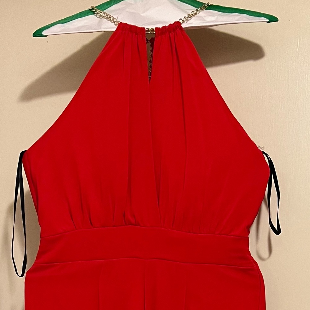 Super cute Womens jumpsuit with a gold chain perfect for the holidays!
